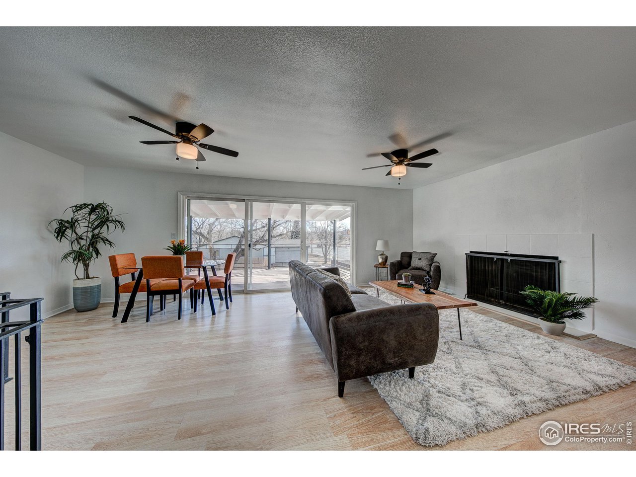 2017 Evergreen Drive Fort Collins, CO 80521 - Photo 10 of 33 a living room with furniture and a fireplace