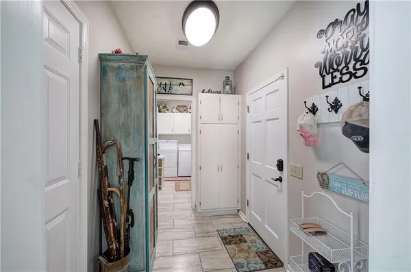 a bathroom with a shower and a sink