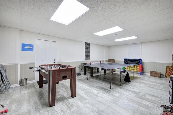 a room with furniture and a wooden floor