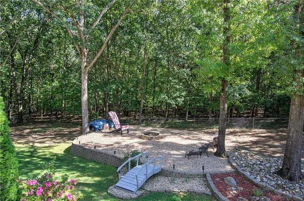 a view of a park with large tree