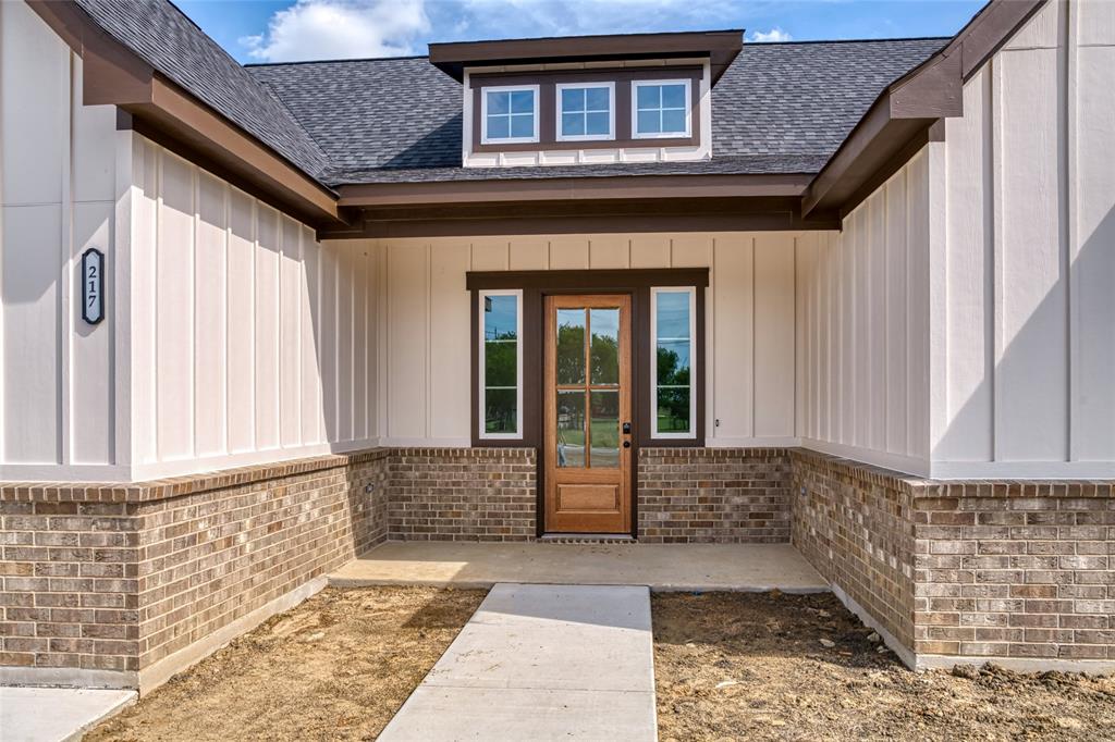 217 Fm 2258 Venus, TX 76084 - Photo 5 of 36 a view of a brick house with large windows