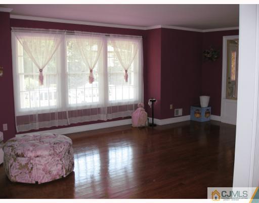 4 Putnam Road Howell, NJ 07731 - Photo 3 of 10 a living room with hard wood floor