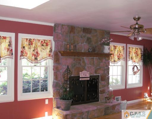 4 Putnam Road Howell, NJ 07731 - Photo 6 of 10 a front view of a house with a fireplace