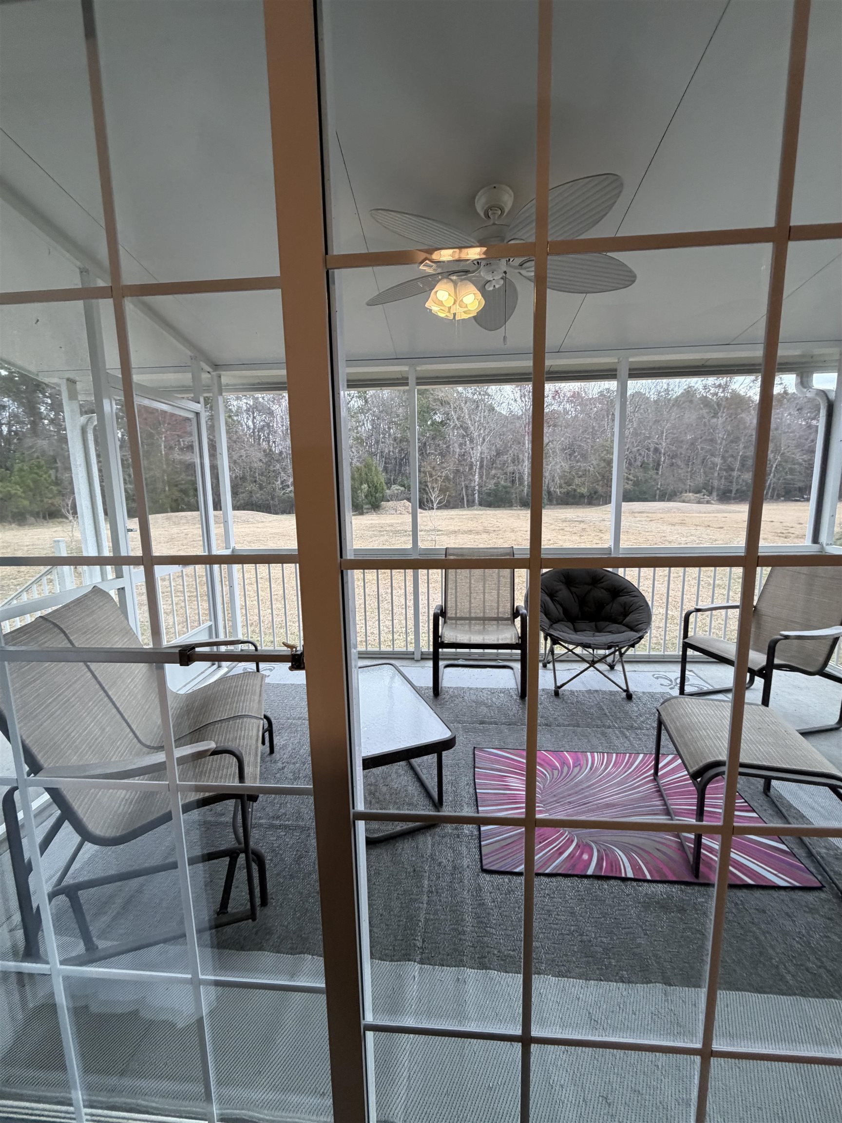 2434 Pellicer Road St. Augustine, FL 32092 - Photo 19 of 41 Sunroom / solarium featuring a ceiling fan and healthy amount of natural light