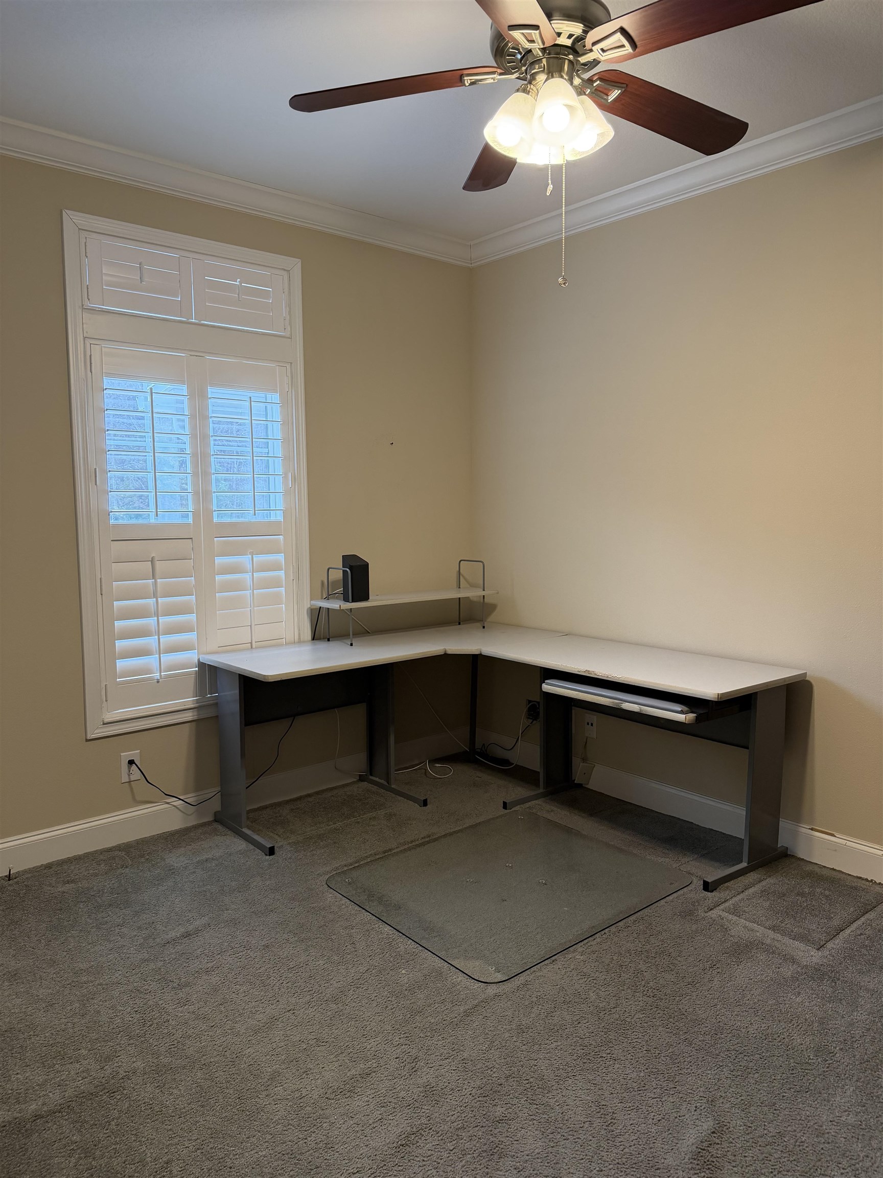 2434 Pellicer Road St. Augustine, FL 32092 - Photo 31 of 41 Unfurnished office featuring light colored carpet, ornamental molding, and a ceiling fan