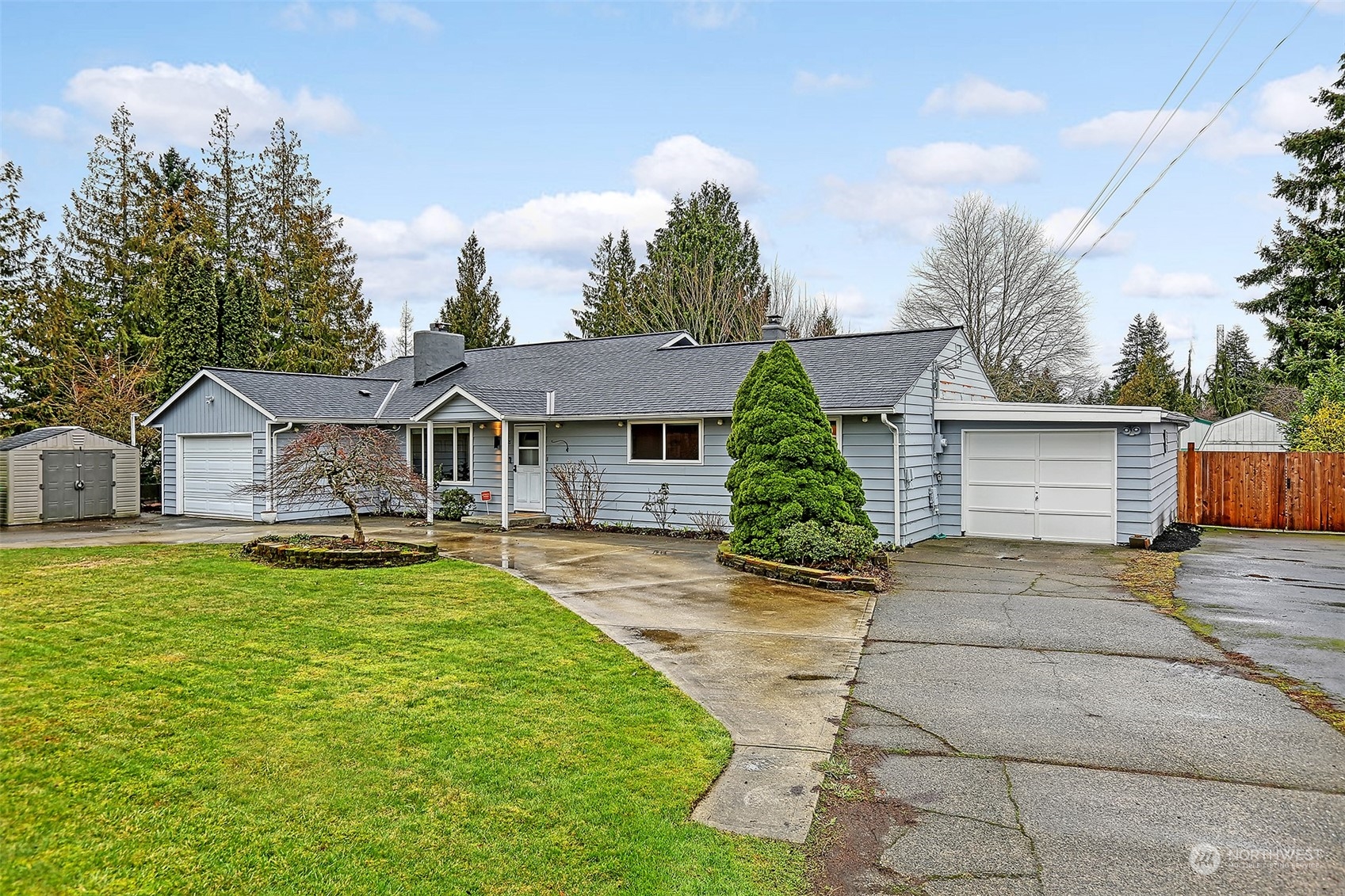 121 Union Avenue Southeast Renton, WA 98059 - Photo 2 of 34 a front view of a house with yard porch and seating area