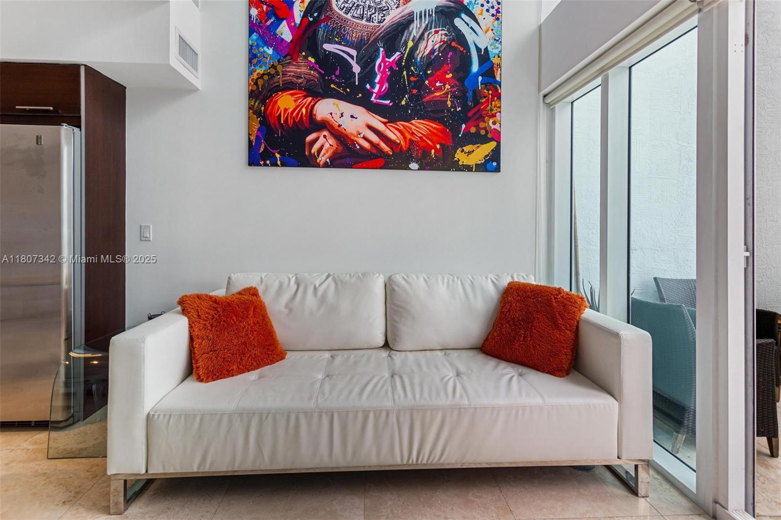 41 Southeast 5th Street, Unit 2008 Miami, FL 33131 - Photo 13 of 54 a bedroom with a bed and cupboard