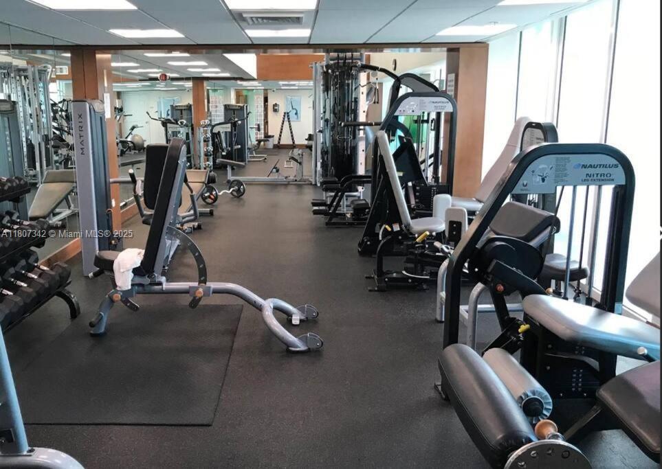 41 Southeast 5th Street, Unit 2008 Miami, FL 33131 - Photo 50 of 54 a view of a room with gym equipment