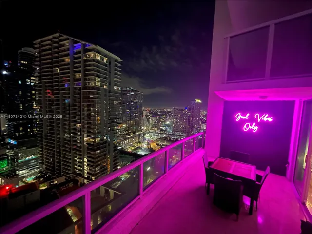 a bedroom with a bed and cupboard