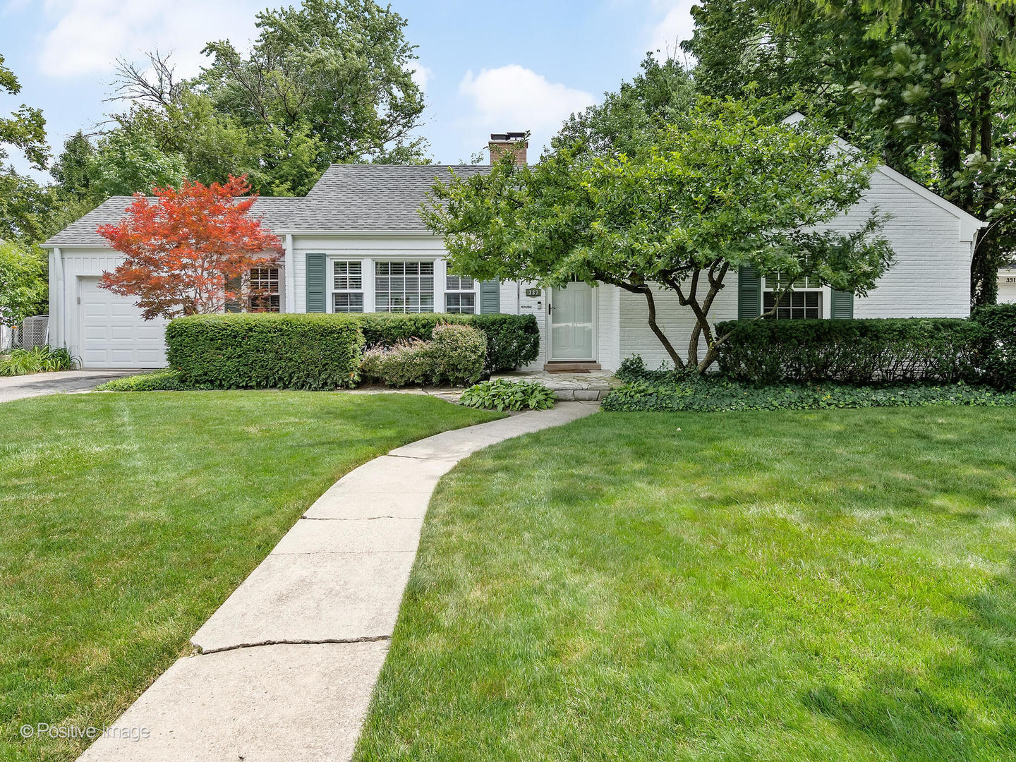 337 Wagner Road Northfield, IL 60093 - Photo 1 of 22 a front view of a house with a yard