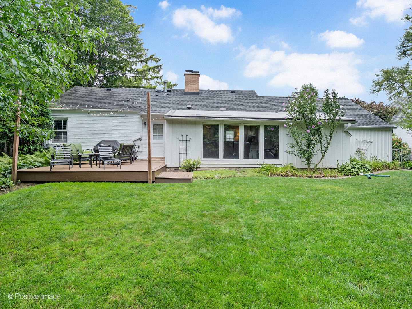337 Wagner Road Northfield, IL 60093 - Photo 18 of 22 a front view of a house with garden