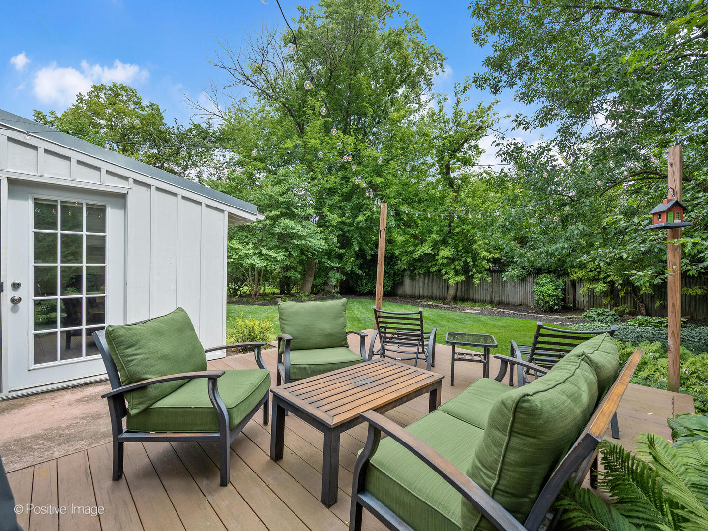 337 Wagner Road Northfield, IL 60093 - Photo 19 of 22 an outdoor sitting area with furniture and a garden