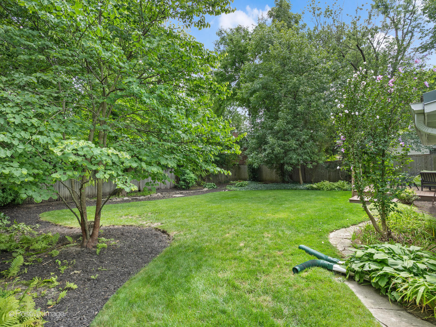 337 Wagner Road Northfield, IL 60093 - Photo 21 of 22 a view of a garden with trees
