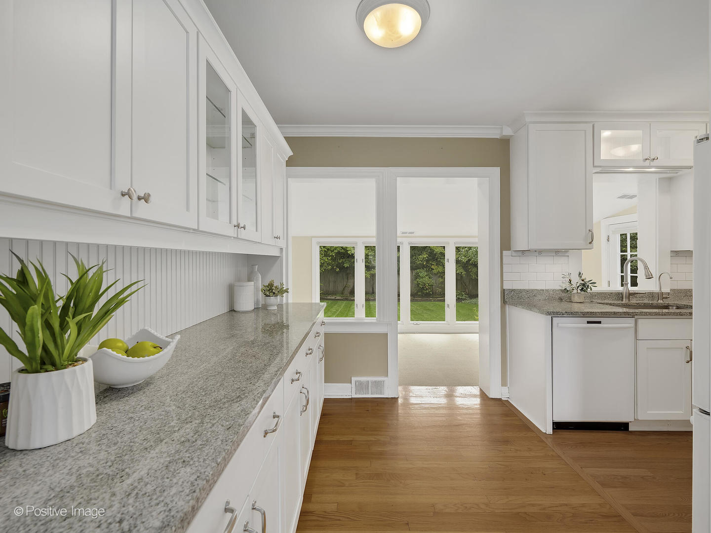 337 Wagner Road Northfield, IL 60093 - Photo 9 of 22 a kitchen with sink and cabinets