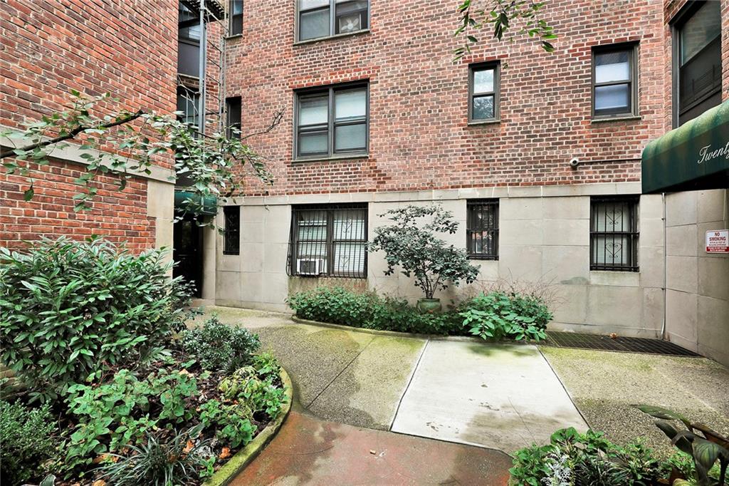 40 89th Street, Unit 4F Brooklyn, NY 11209 - Photo 20 of 22 a front view of a house with garden