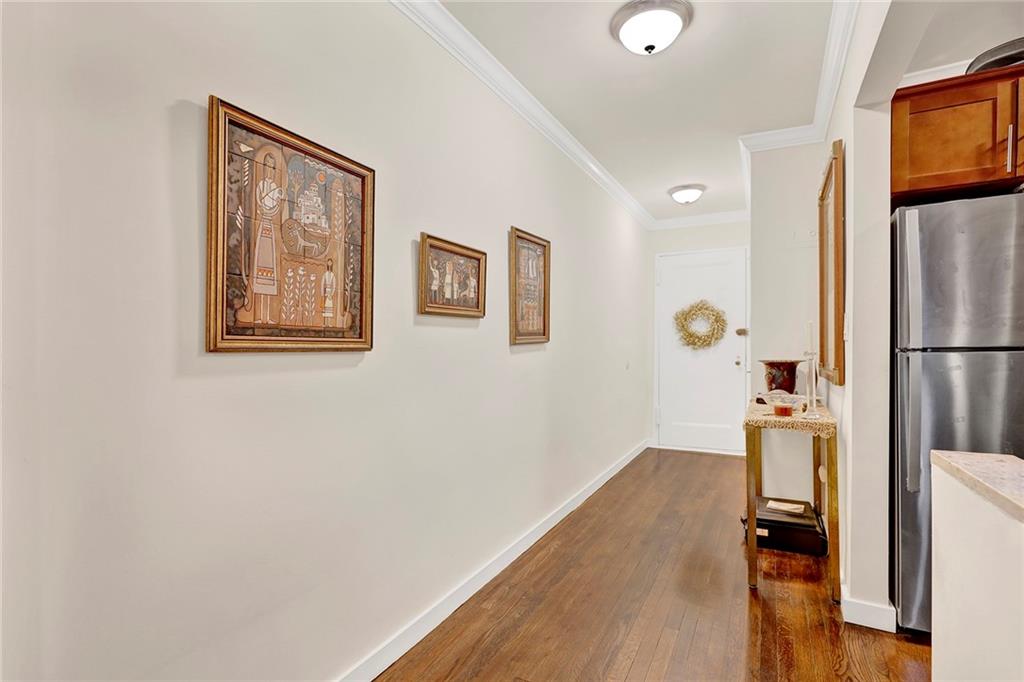 40 89th Street, Unit 4F Brooklyn, NY 11209 - Photo 6 of 22 a view of a hallway with workspace