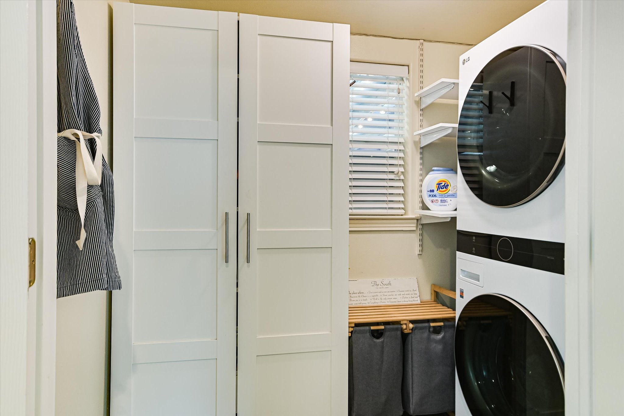2805 South 5th Street Austin, TX 78704 - Photo 15 of 25 Laundry room featuring storage
