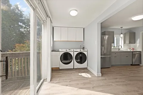 a utility room with a washer and dryer