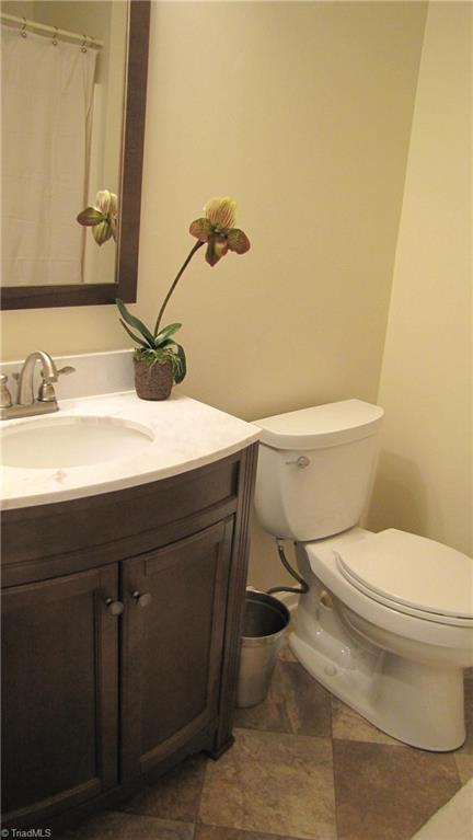 6315 Hampton Knoll Road Clemmons, NC 27012 - Photo 14 of 17 Bath with new cabinet and flooring