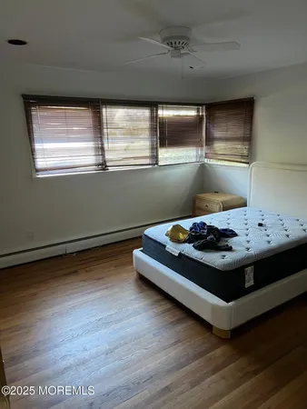 a room with window and wooden floor