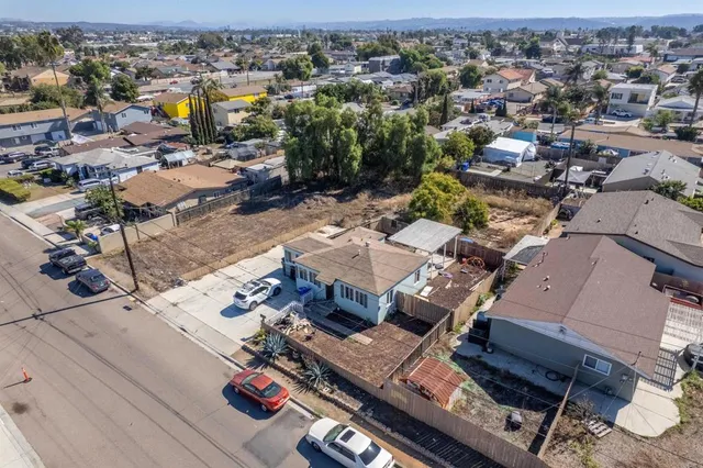 an aerial view of a city with lots of residential buildings