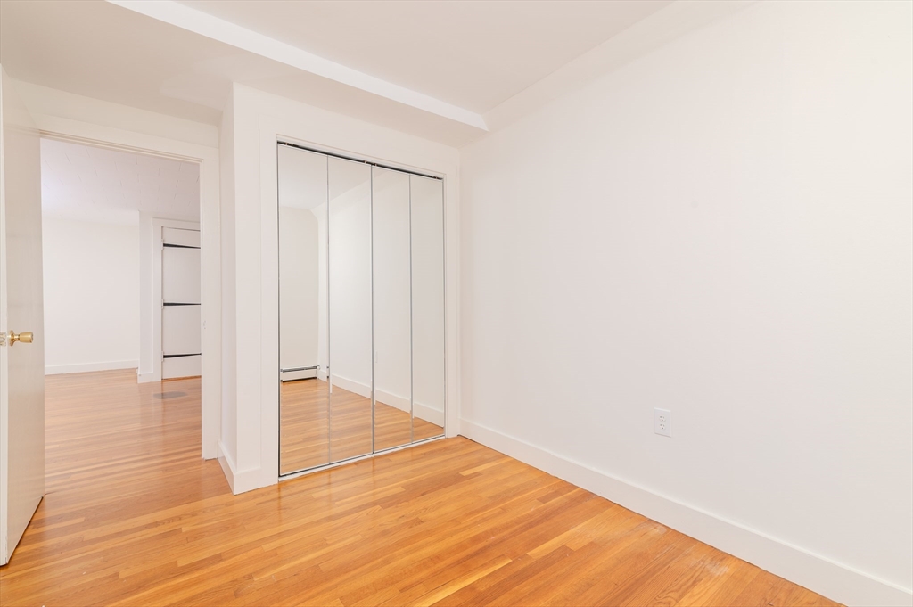 660 Jerusalem Road, Unit 4 Cohasset, MA 02025 - Photo 13 of 20 a view of an empty room