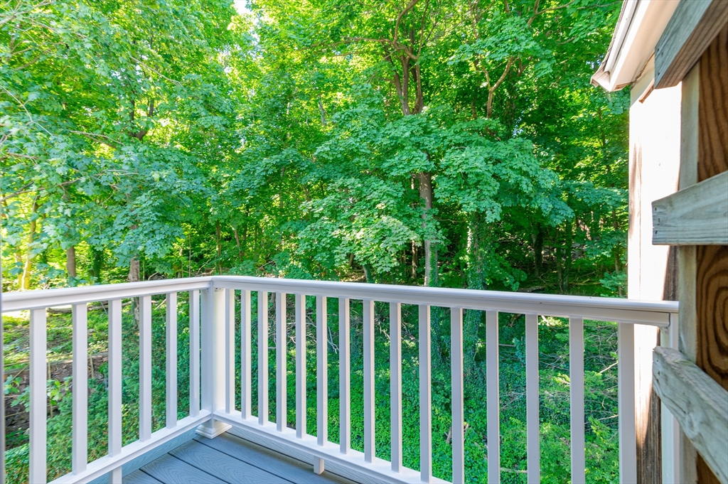 660 Jerusalem Road, Unit 4 Cohasset, MA 02025 - Photo 5 of 20 a view of balcony with wooden floor