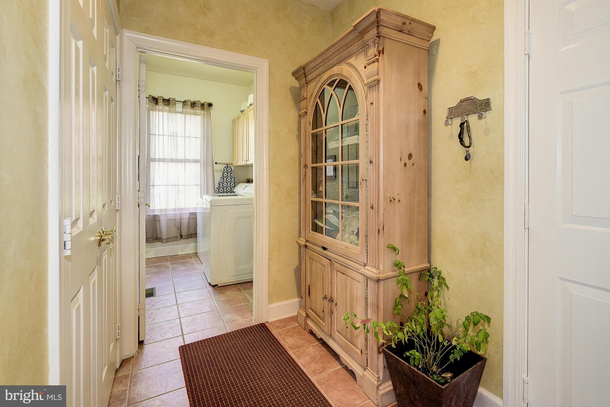 10412 Grey Fox Road Potomac, MD 20854 - Photo 13 of 30 a view of entryway with bathroom and shower