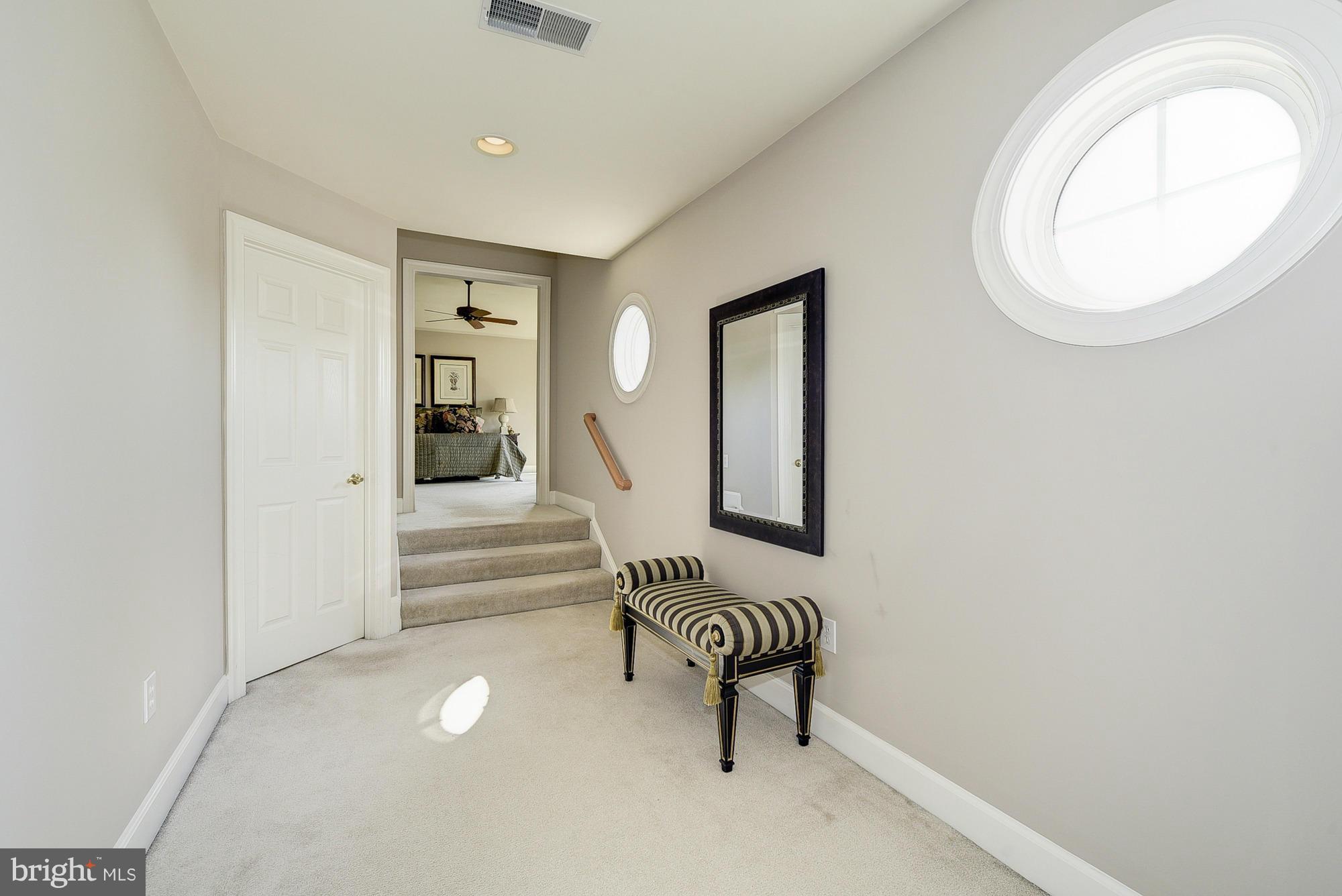 10412 Grey Fox Road Potomac, MD 20854 - Photo 15 of 30 a view of entryway with stairs and a workspace