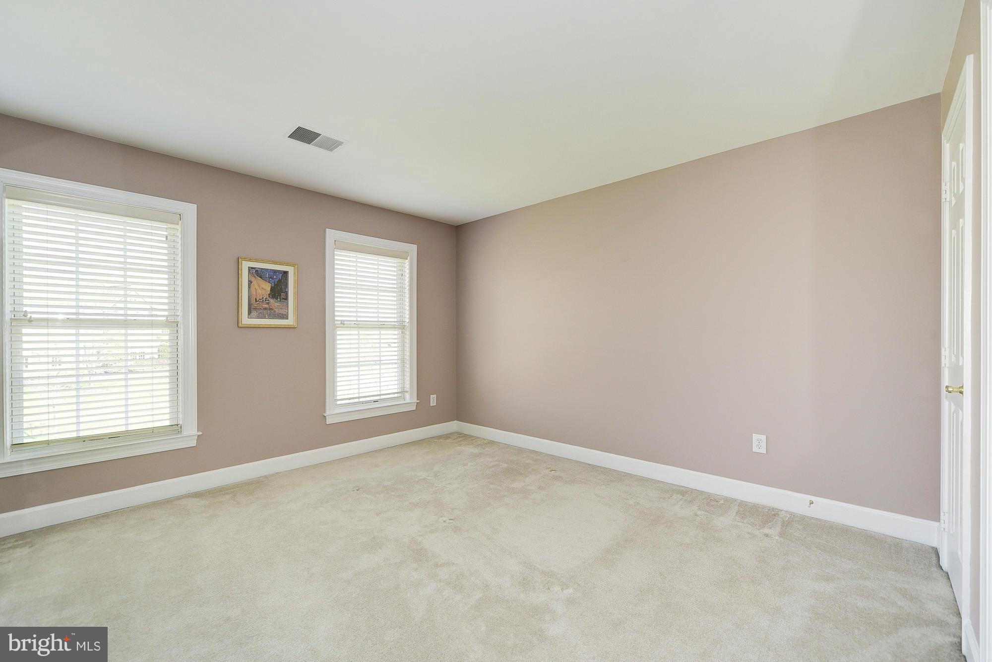 10412 Grey Fox Road Potomac, MD 20854 - Photo 20 of 30 an empty room with windows