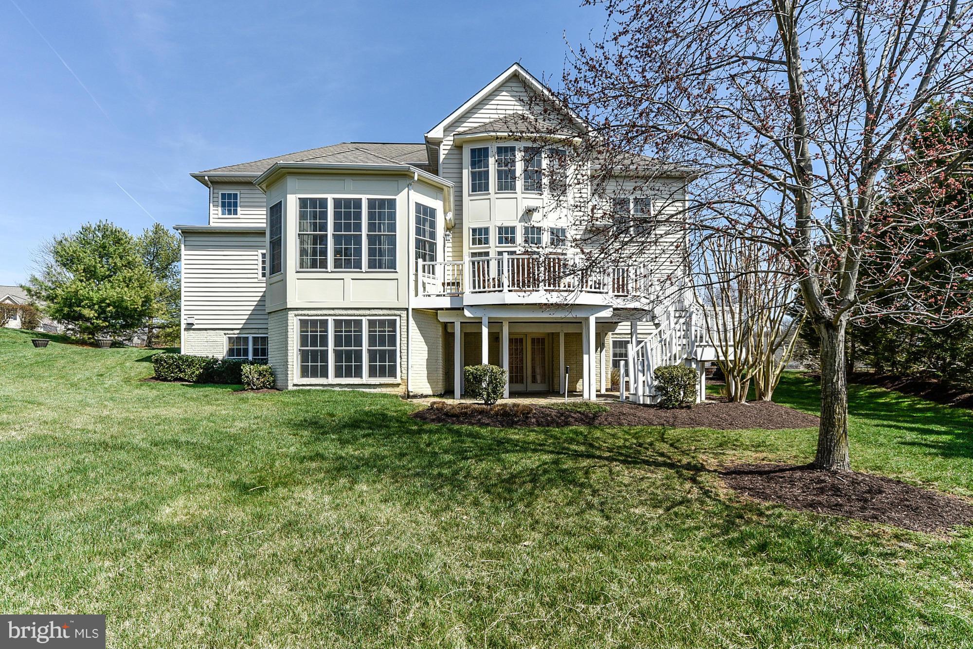 10412 Grey Fox Road Potomac, MD 20854 - Photo 30 of 30 a front view of a house with a yard