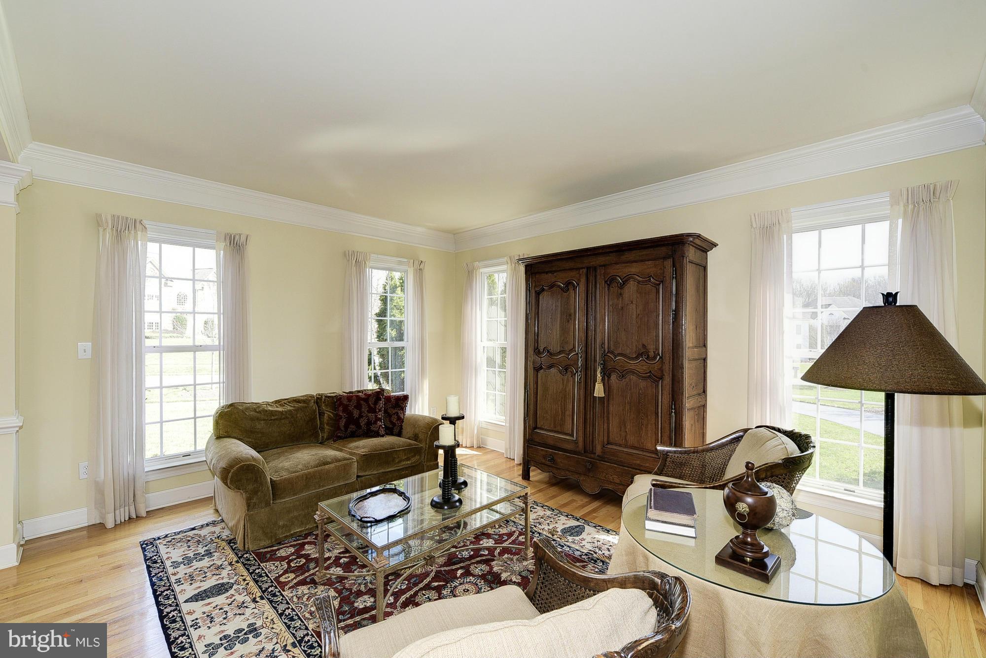 10412 Grey Fox Road Potomac, MD 20854 - Photo 4 of 30 a living room with furniture and a window