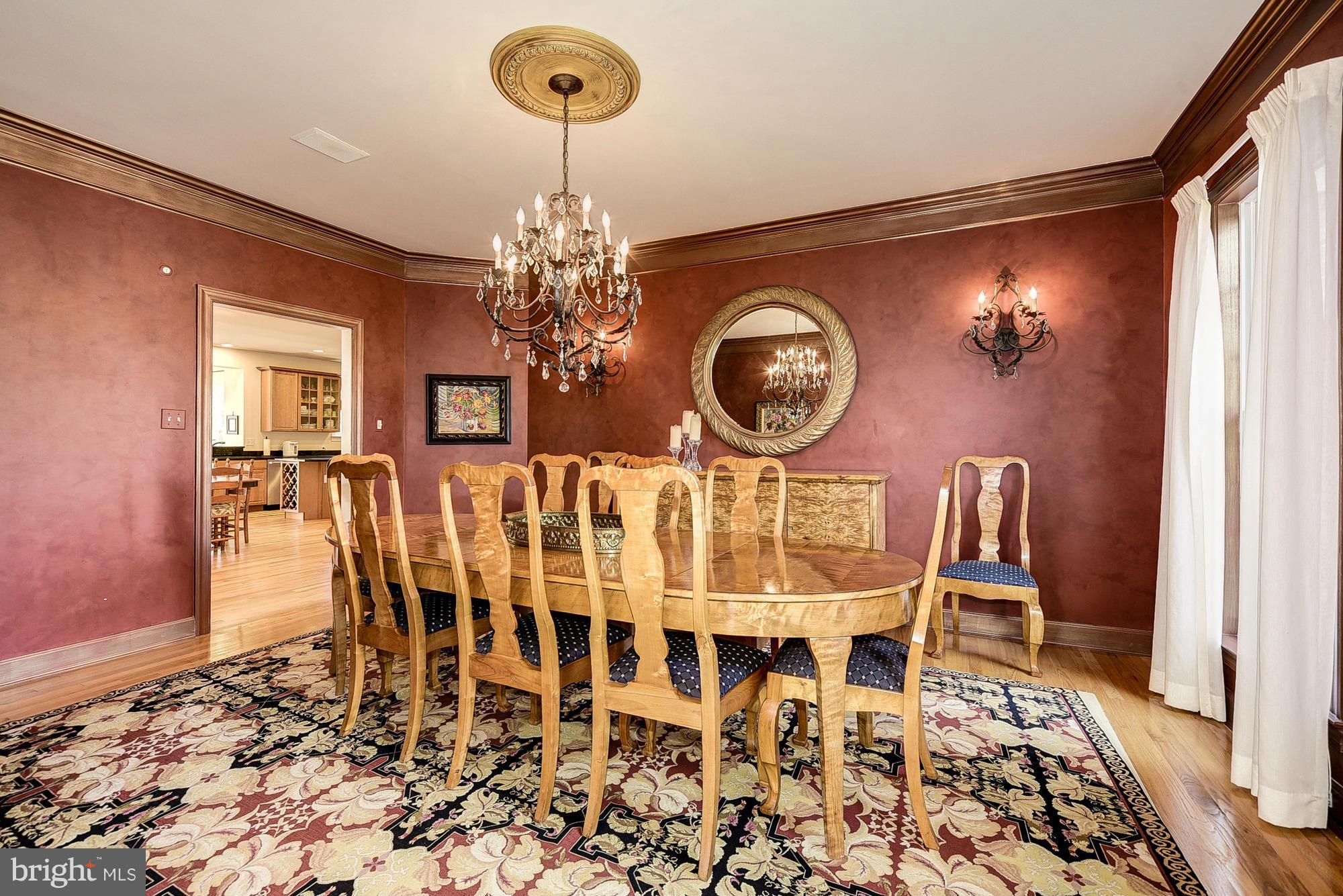 10412 Grey Fox Road Potomac, MD 20854 - Photo 5 of 30 a view of a dining room with furniture and chandelier