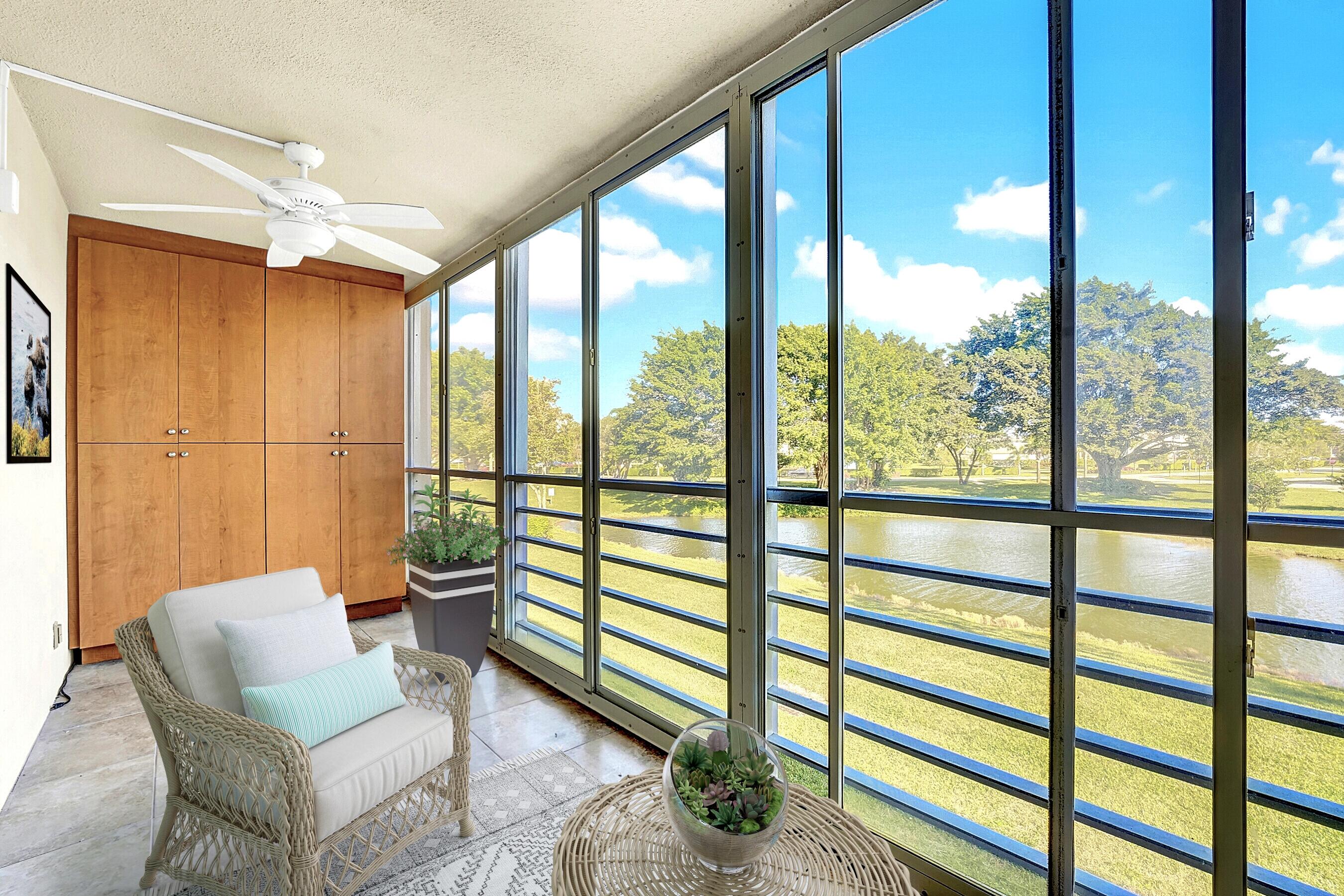 2046 Rexford Drive Boca Raton, FL 33434 - Photo 15 of 27 Florida Room Overlooking the Lake