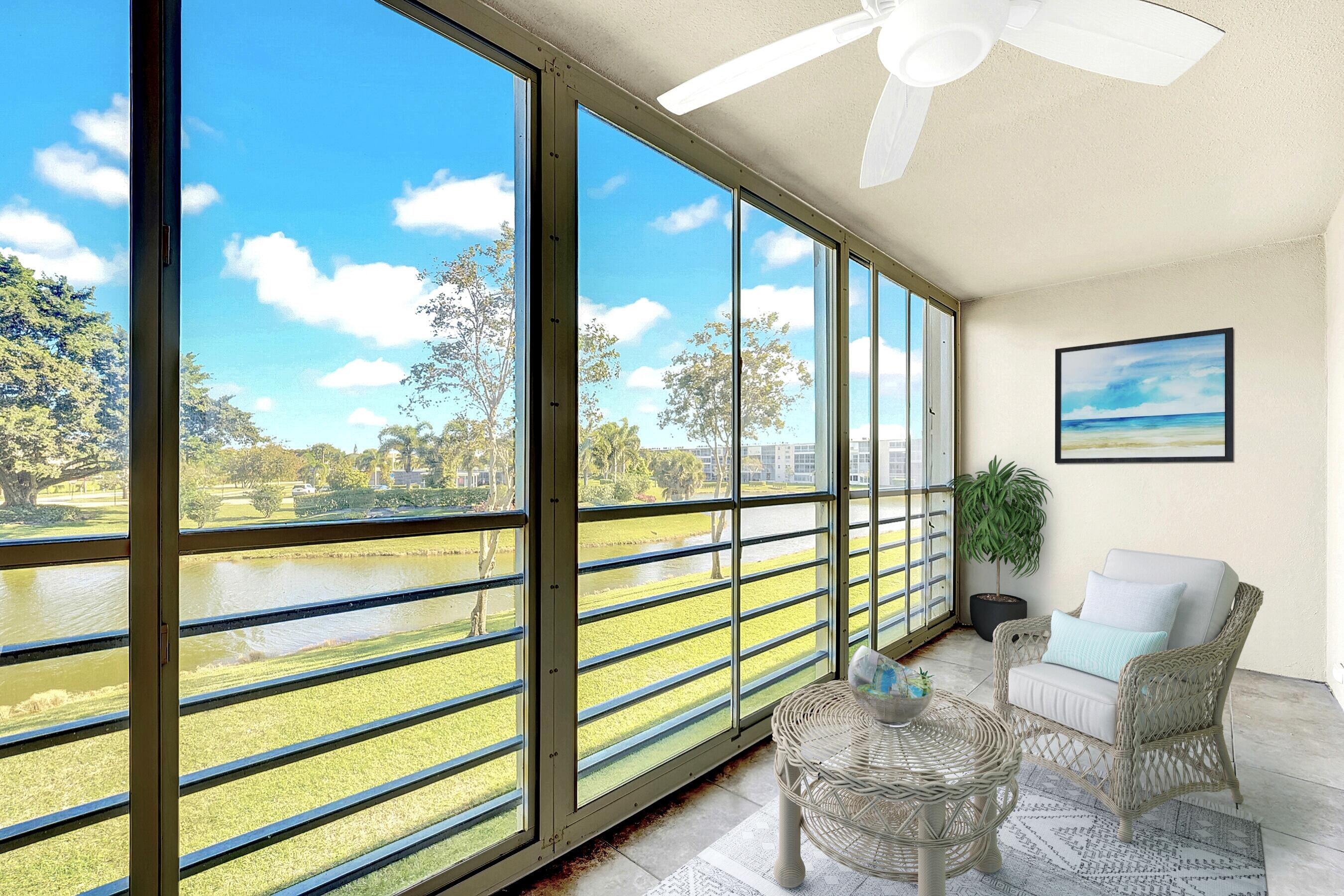 2046 Rexford Drive Boca Raton, FL 33434 - Photo 16 of 27 Florida Room Overlooking the Lake