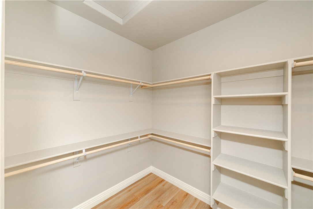3640 North Kenneth Road Kingman, AZ 86409 - Photo 24 of 44 Walk in closet featuring light wood-style flooring