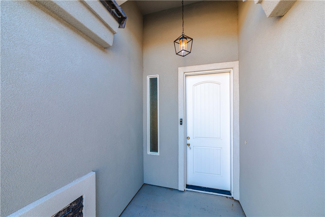 3640 North Kenneth Road Kingman, AZ 86409 - Photo 3 of 44 Entrance to property with stucco siding