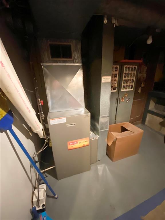 141 Overbeck Street Pittsburgh, PA 15212 - Photo 17 of 20 a picture of water heater room