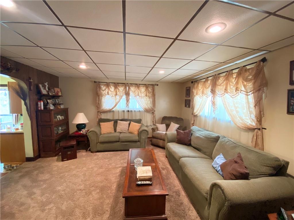 141 Overbeck Street Pittsburgh, PA 15212 - Photo 2 of 20 a living room with furniture and a large window