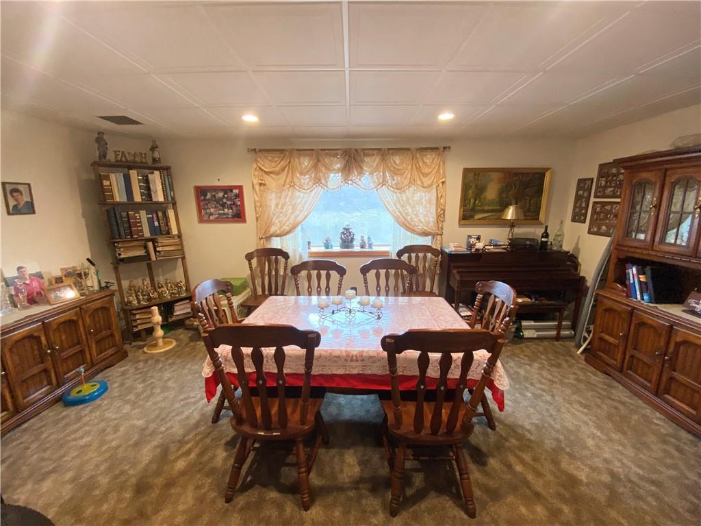 141 Overbeck Street Pittsburgh, PA 15212 - Photo 6 of 20 a view of a dining room with furniture
