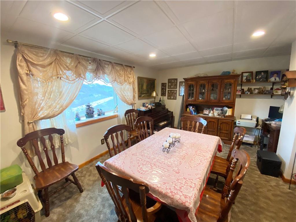 141 Overbeck Street Pittsburgh, PA 15212 - Photo 7 of 20 a view of a dining room with furniture window and outside view