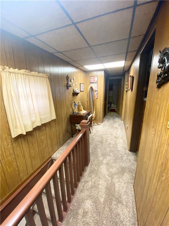 141 Overbeck Street Pittsburgh, PA 15212 - Photo 9 of 20 a view of a hallway with wooden floor and stairs