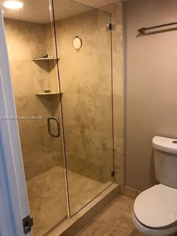 a view of a living room and a window