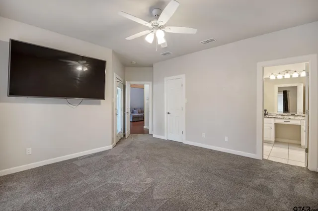 a view of a livingroom with a flat screen tv