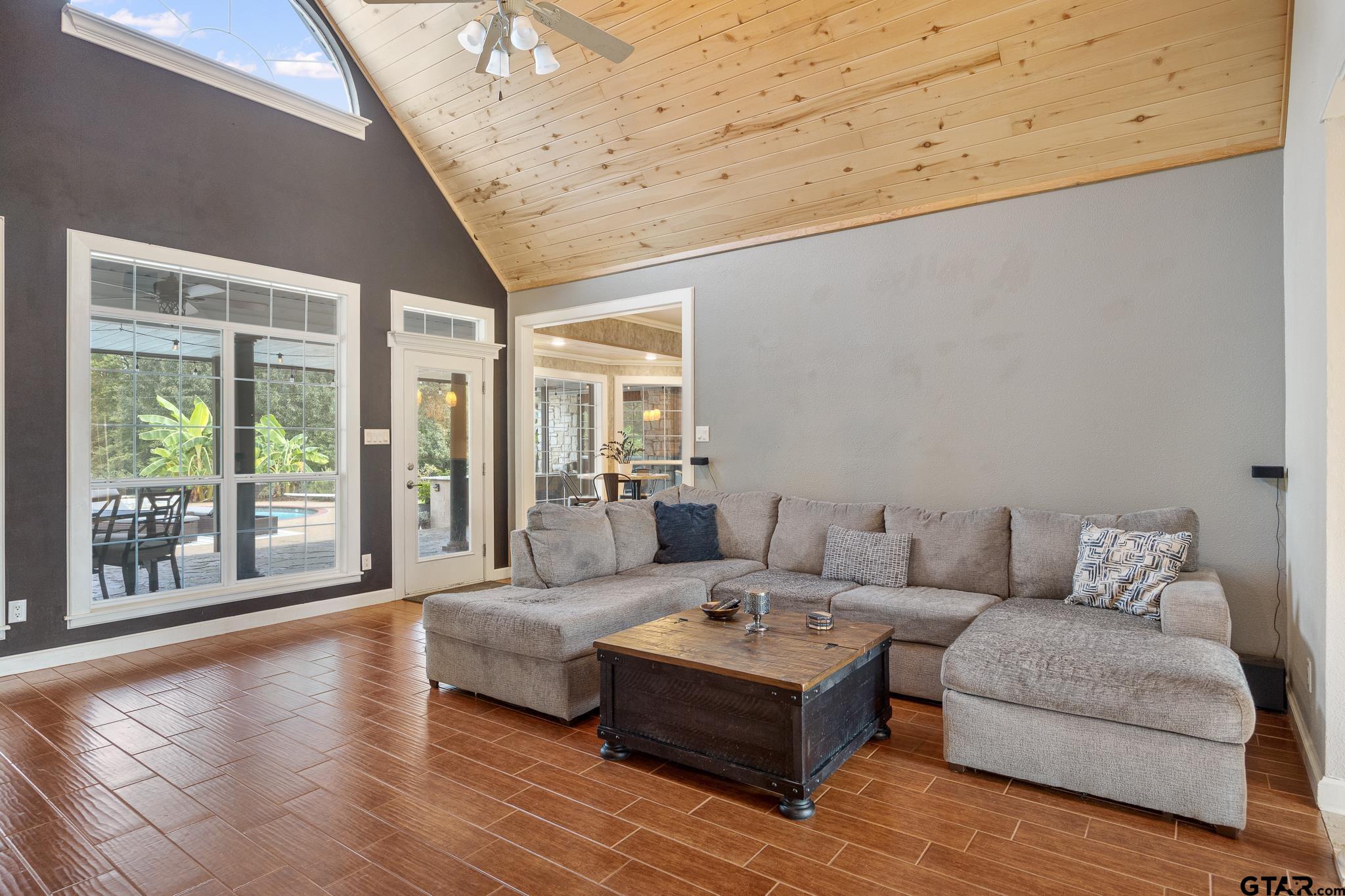 344 Antler Road Longview, TX 75605 - Photo 8 of 45 a living room with furniture and large windows