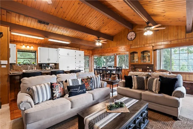 a view of a living room with furniture