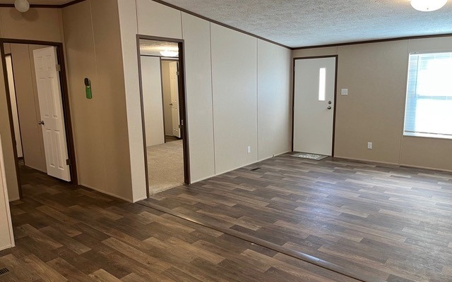 654 Burger Road Murphy, NC 28906 - Photo 11 of 33 an empty room with wooden floor and windows