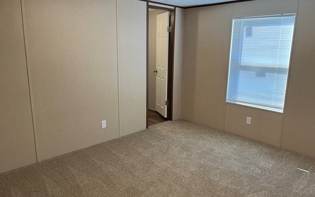 654 Burger Road Murphy, NC 28906 - Photo 18 of 33 an empty room with windows and closet