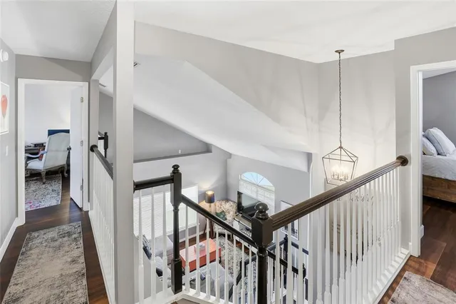 a view of a hallway view with staircase