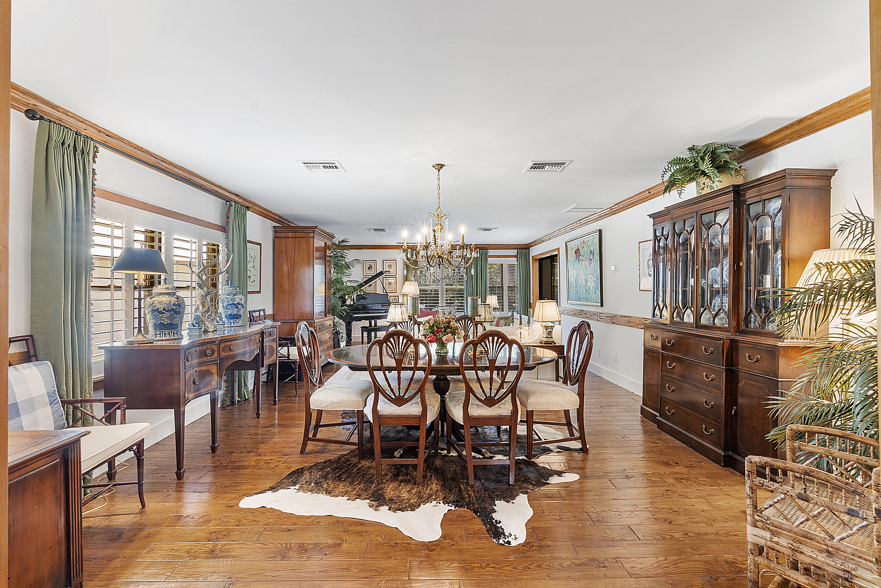 32801 Highway 441, Unit 64 Okeechobee, FL 34972 - Photo 19 of 138 a dining room with furniture window and wooden floor